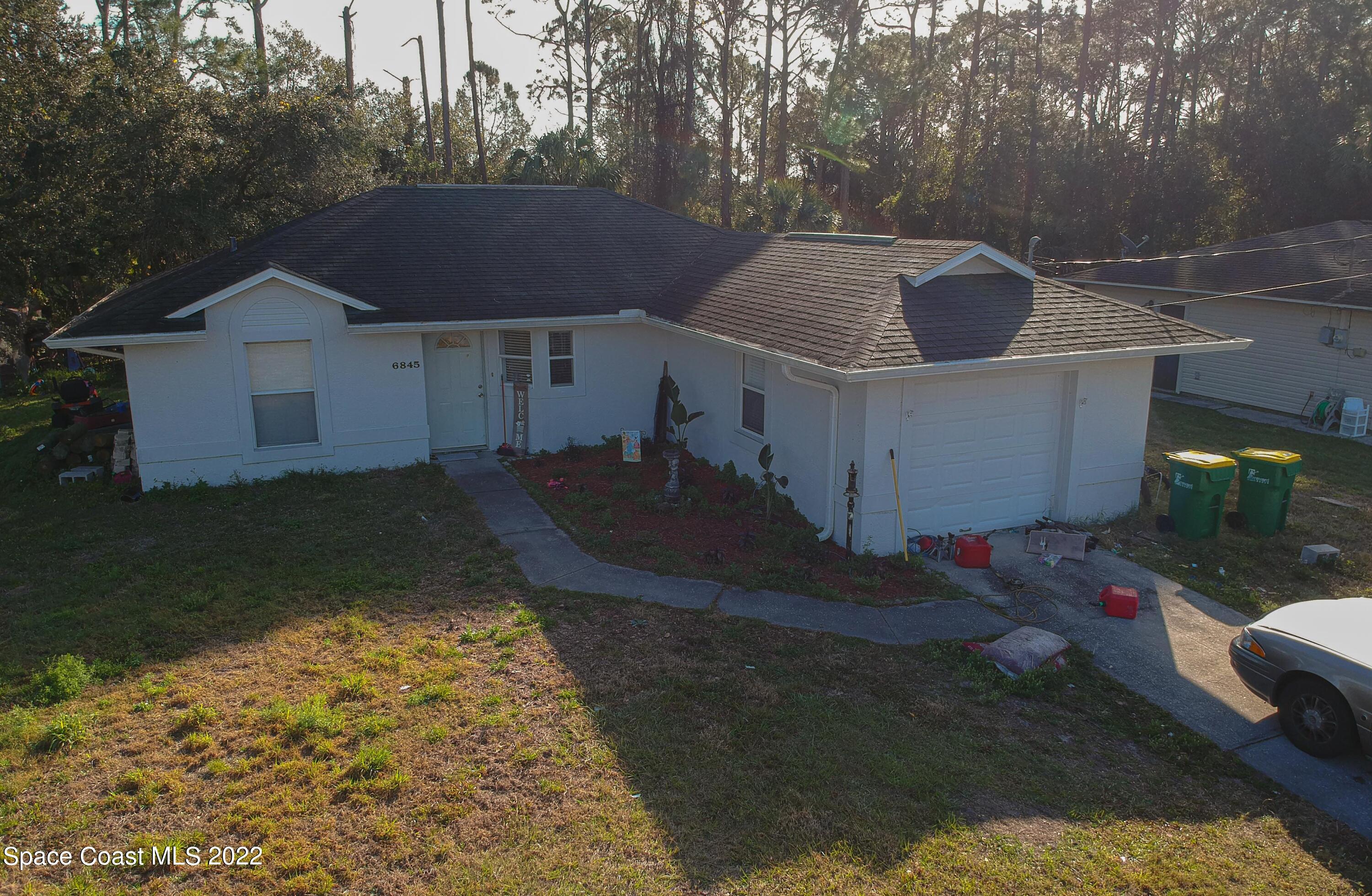 6845 Spring Street Cocoa, FL 32927 - Photo 45 of 45 a view of outdoor space and yard