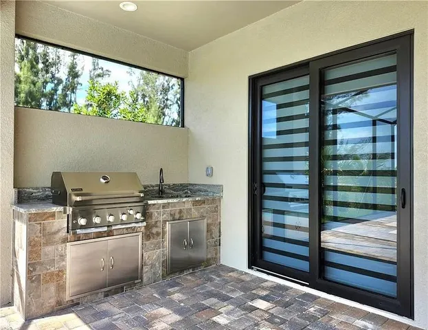 a kitchen with a stove and a cabinet