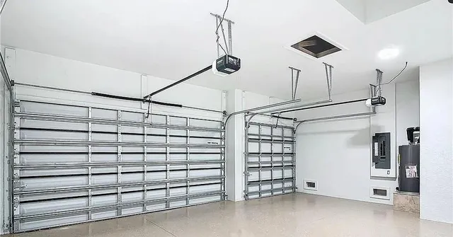 an aerial view of a house with yard and sitting area