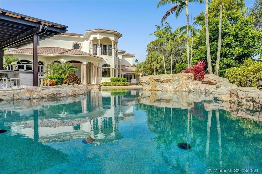 2920 Hunter Road Weston, FL 33331 - Photo 2 of 51 a view of house with a yard