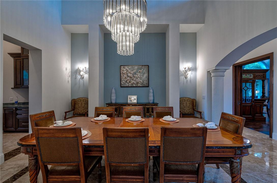 2920 Hunter Road Weston, FL 33331 - Photo 23 of 51 a view of a dining room with furniture