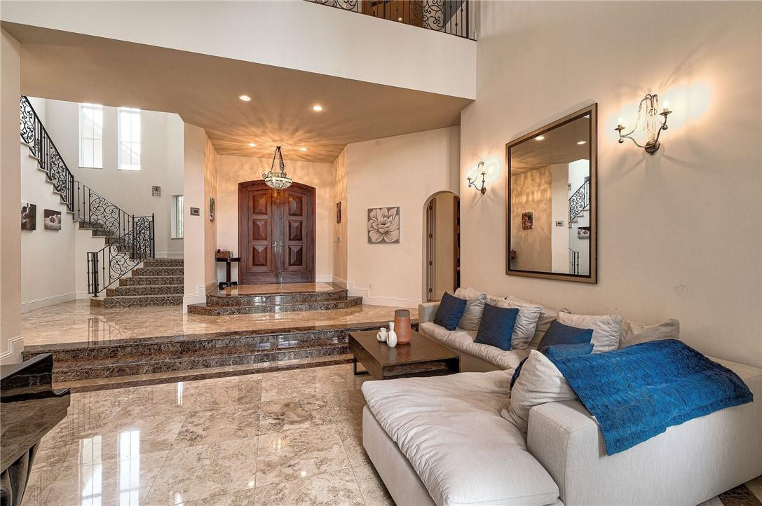 2920 Hunter Road Weston, FL 33331 - Photo 27 of 51 a living room with furniture and a rug