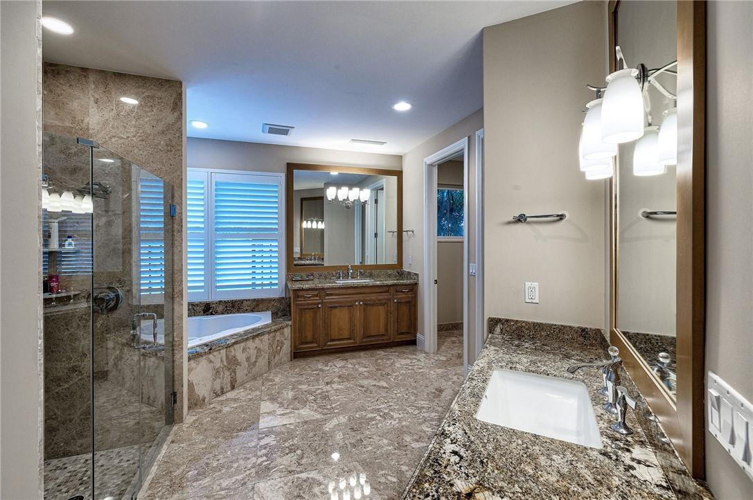 2920 Hunter Road Weston, FL 33331 - Photo 35 of 51 a bathroom with a tub shower and sink