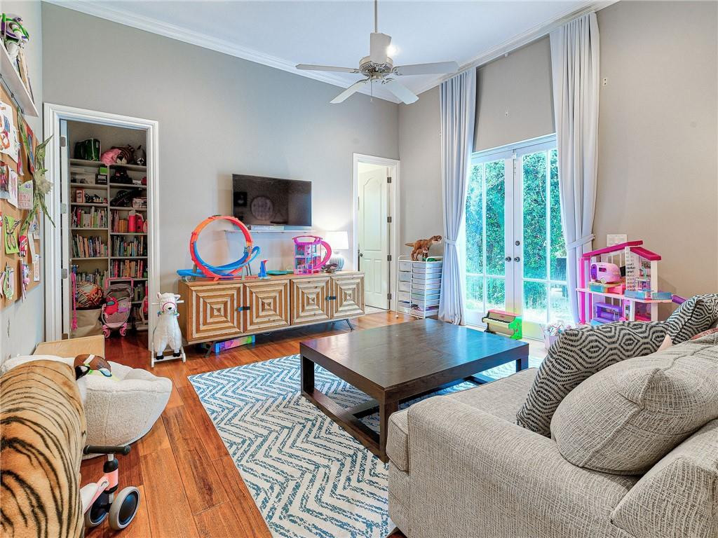 2920 Hunter Road Weston, FL 33331 - Photo 39 of 51 a living room with furniture a rug and a window