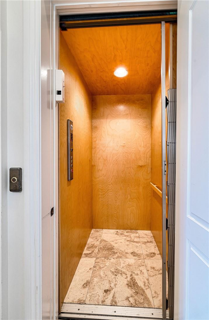 2920 Hunter Road Weston, FL 33331 - Photo 45 of 51 view of a bathroom with wooden floor and door