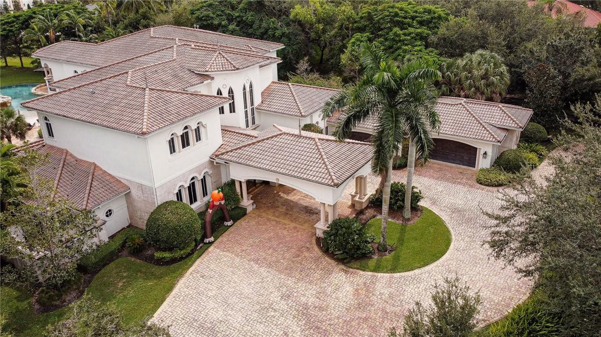 2920 Hunter Road Weston, FL 33331 - Photo 48 of 51 a aerial view of a house with a yard table and chairs