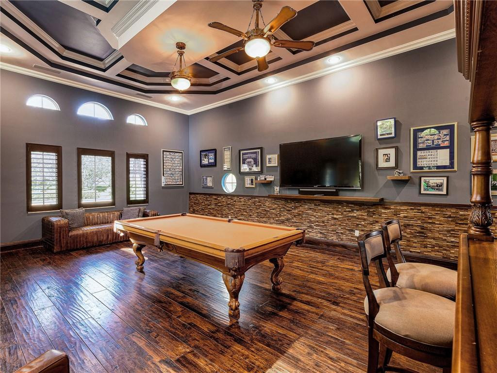 2920 Hunter Road Weston, FL 33331 - Photo 10 of 51 a living room with furniture pool table and a flat screen tv