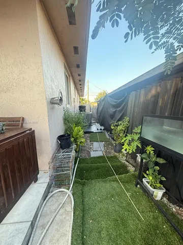 a garden view with a seating space