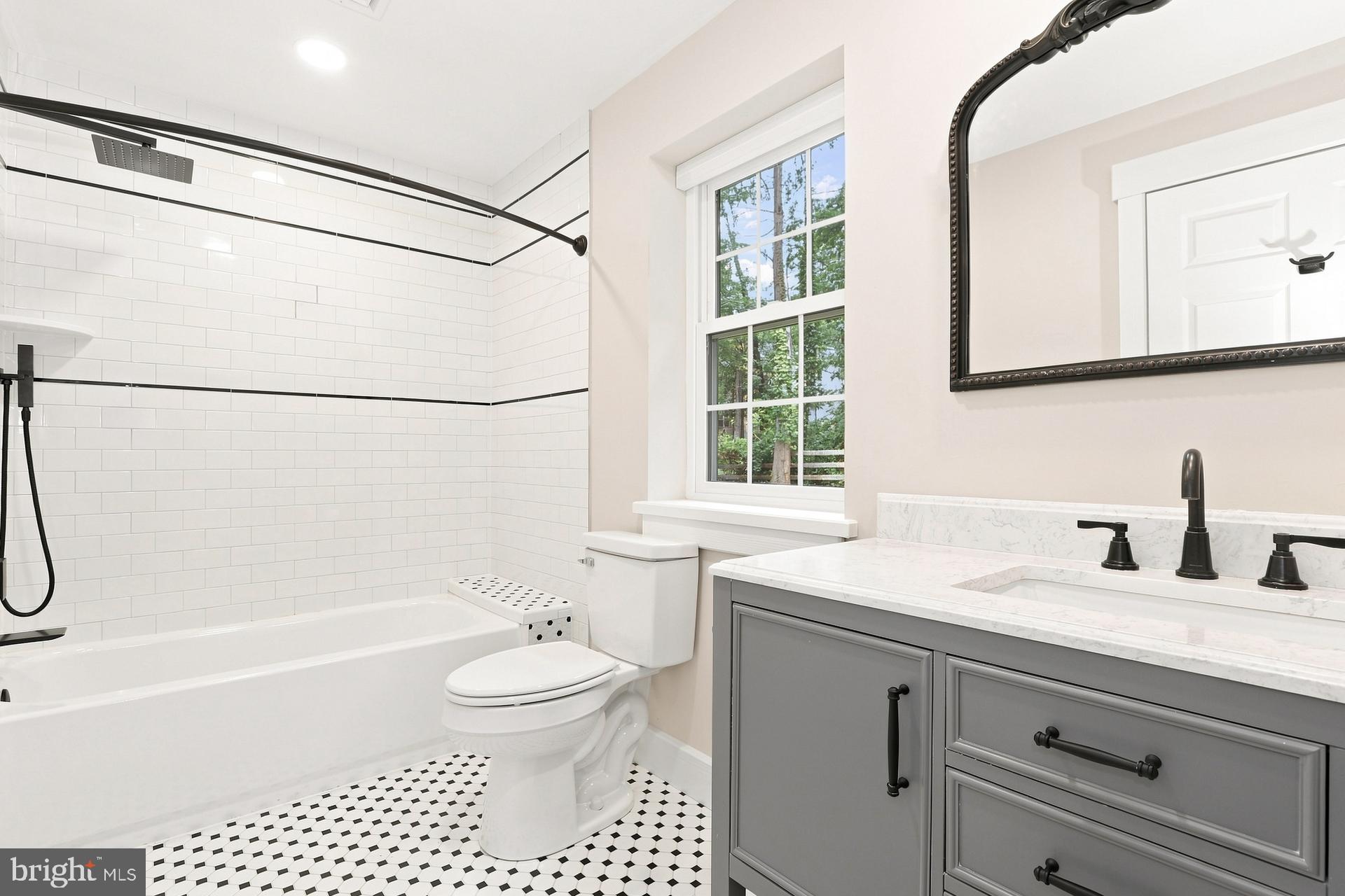 5567 Pennell Road Aston, PA 19014 - Photo 12 of 15 Modern elegance in a serene bathroom.