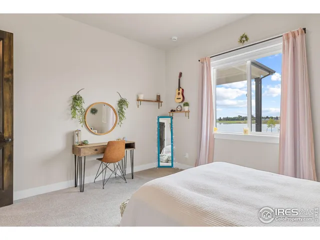 a bedroom with a bed and a cabinets