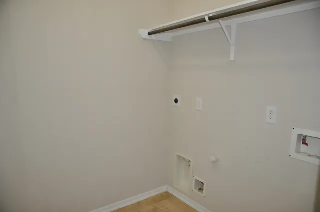 a small space with a shower and dryer