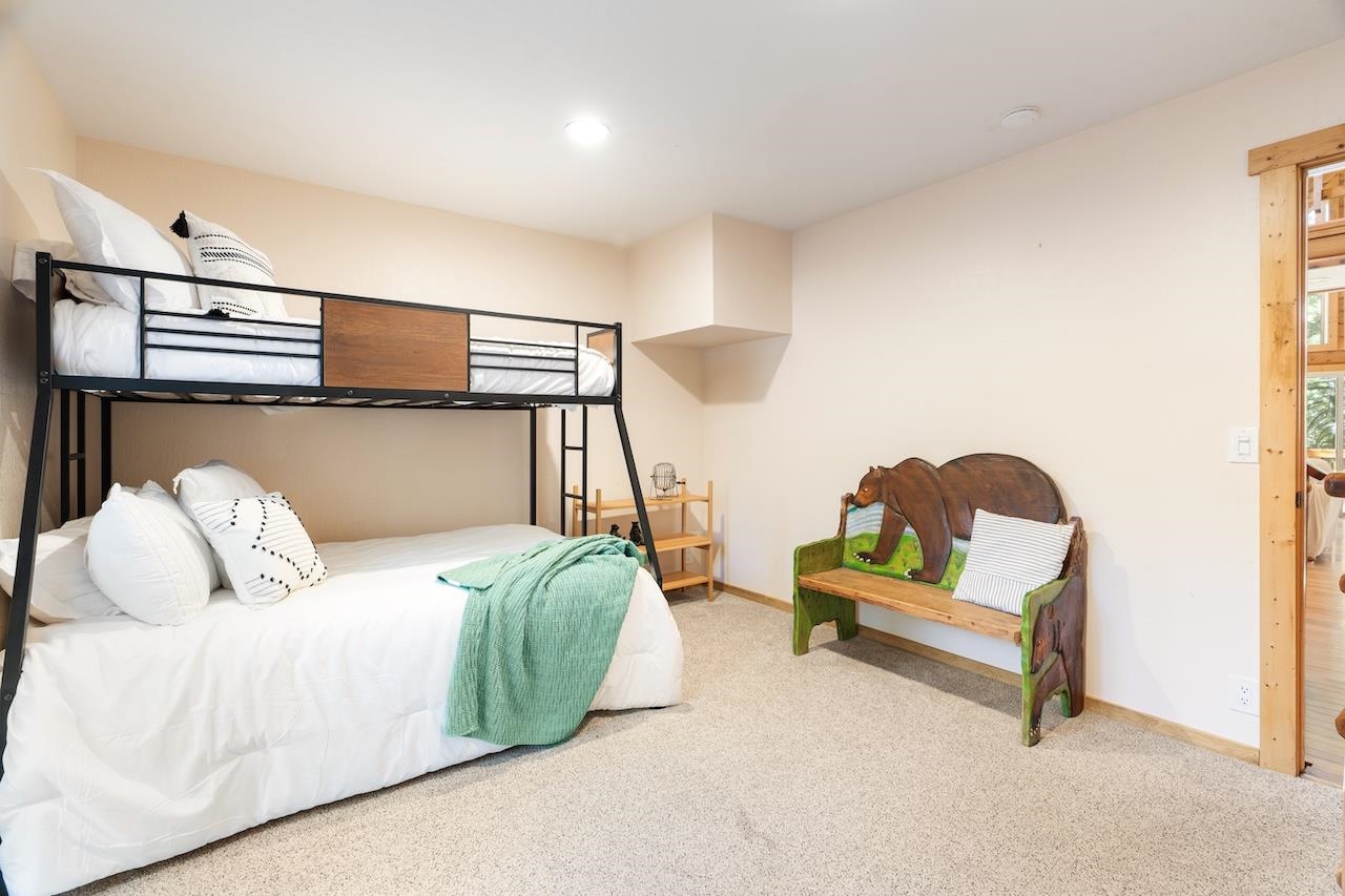 11940 Sitzmark Way Truckee, CA 96161 - Photo 11 of 28 a bedroom with a bed and a night stand