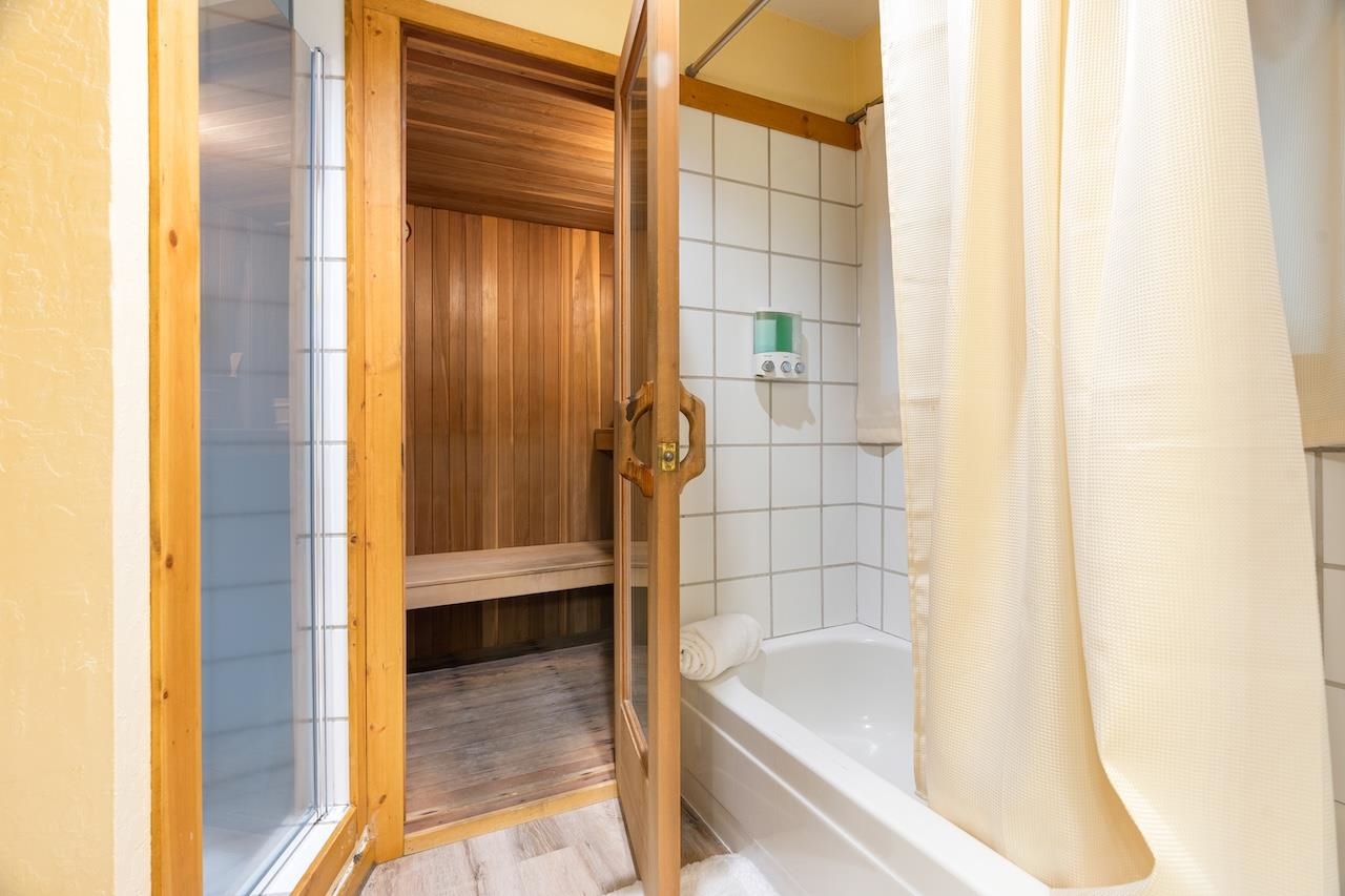 11940 Sitzmark Way Truckee, CA 96161 - Photo 15 of 28 a bathroom with a bathtub and shower