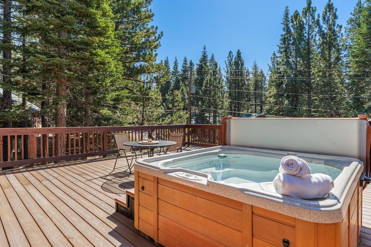 11940 Sitzmark Way Truckee, CA 96161 - Photo 21 of 28 a view of roof deck with chairs and wooden floor