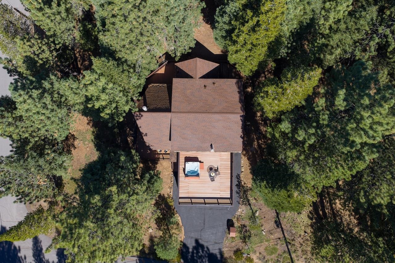 11940 Sitzmark Way Truckee, CA 96161 - Photo 24 of 28 an aerial view of a house with a yard and large trees
