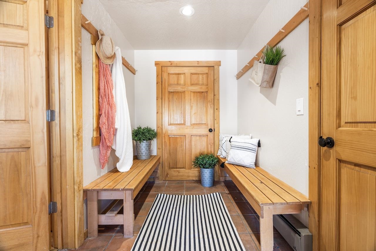 11940 Sitzmark Way Truckee, CA 96161 - Photo 3 of 28 a bedroom with a bed and wooden floor