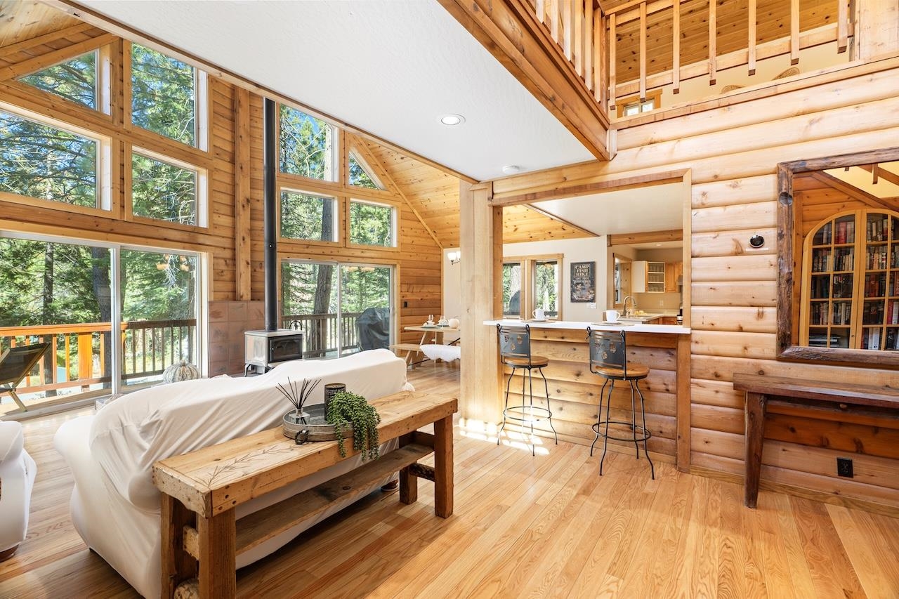 11940 Sitzmark Way Truckee, CA 96161 - Photo 5 of 28 a living room with furniture and a large window