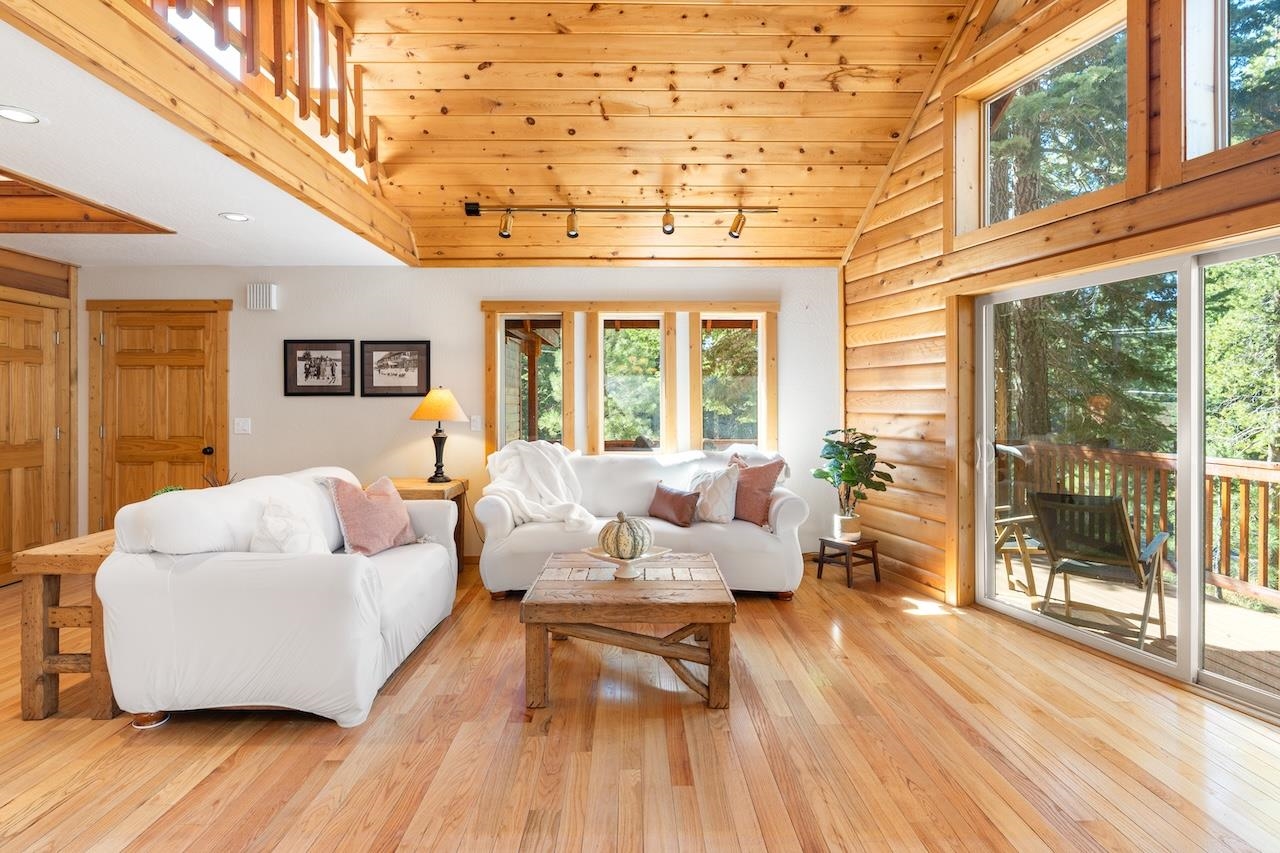 11940 Sitzmark Way Truckee, CA 96161 - Photo 6 of 28 a living room with furniture and a large window