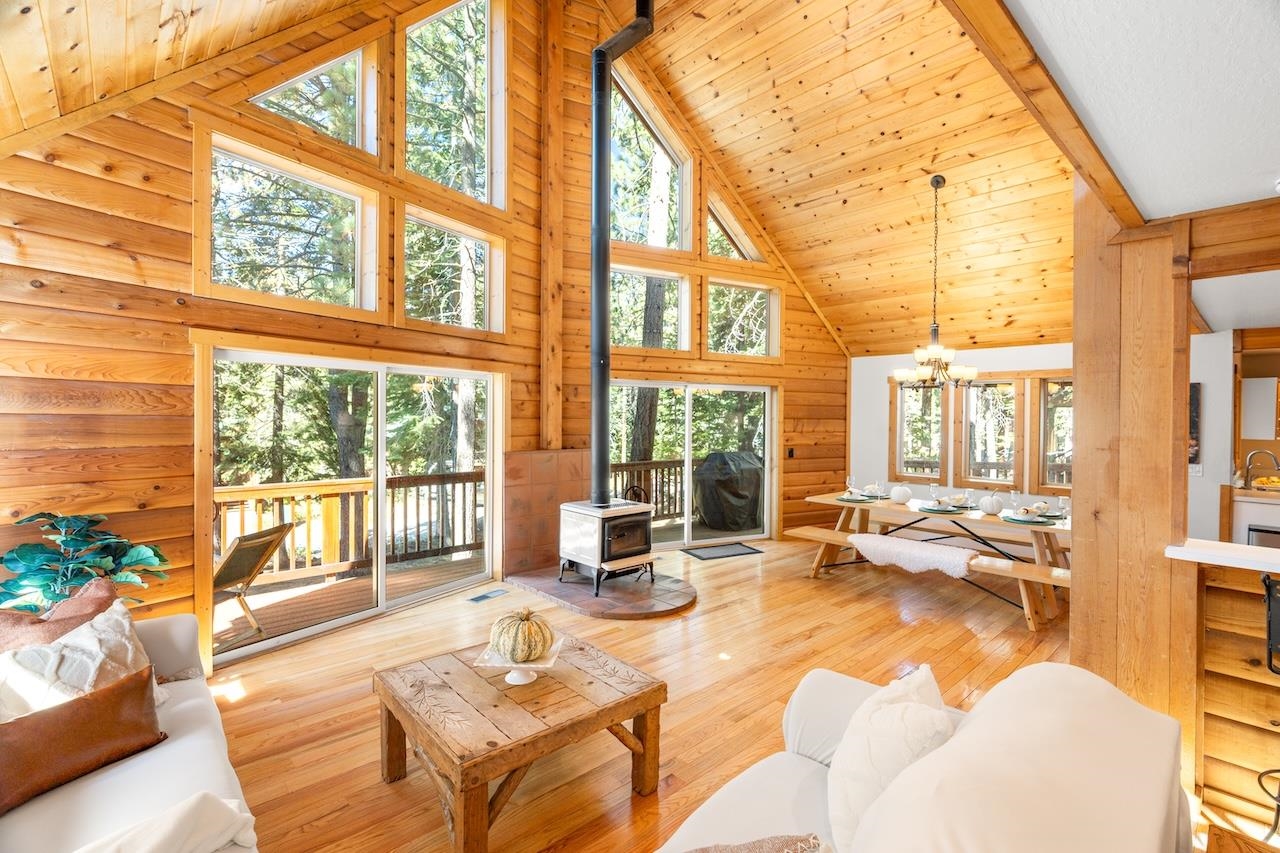 11940 Sitzmark Way Truckee, CA 96161 - Photo 7 of 28 a living room with furniture and floor to ceiling windows