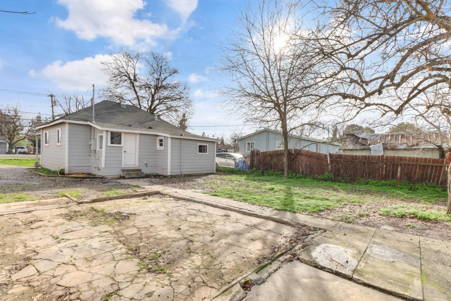 1099 Grand Avenue Olivehurst, CA 95961 - Photo 32 of 38 a view of a yard with a house