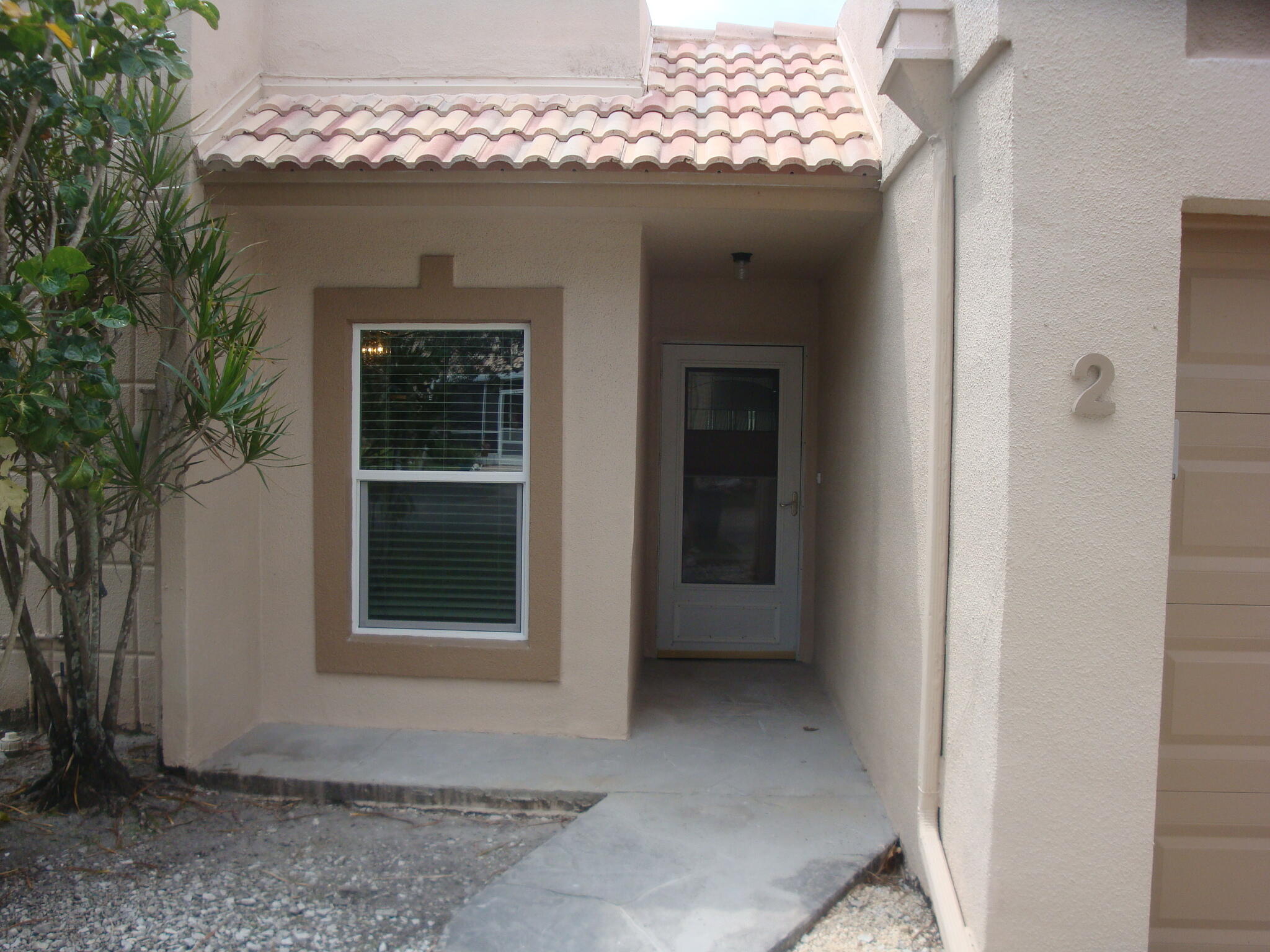 9124 Flynn Circle, Unit 2 Boca Raton, FL 33496 - Photo 3 of 52 Front View
