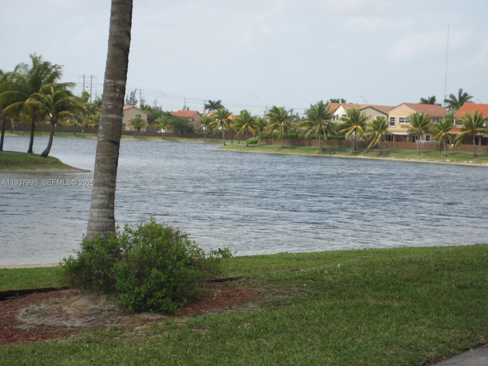 13224 Southwest 10th Terrace Miami, FL 33184 - Photo 17 of 32 a view of a lake with a big yard