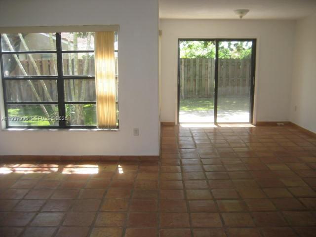 13224 Southwest 10th Terrace Miami, FL 33184 - Photo 2 of 32 a view of an empty room with a window