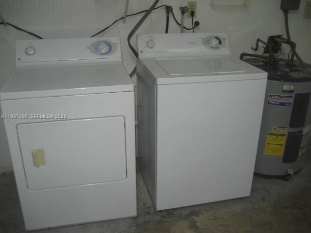 13224 Southwest 10th Terrace Miami, FL 33184 - Photo 27 of 32 a utility room with dryer and washer