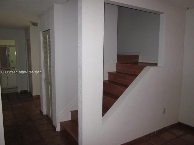 13224 Southwest 10th Terrace Miami, FL 33184 - Photo 29 of 32 a view of a hallway with wooden floor and entryway