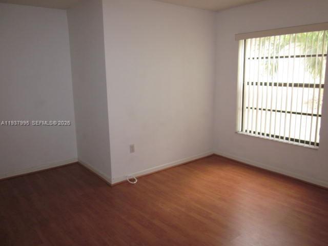 13224 Southwest 10th Terrace Miami, FL 33184 - Photo 9 of 32 an empty room with a window