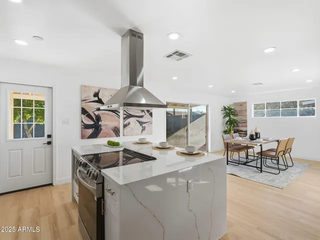 a view of a dining room with furniture