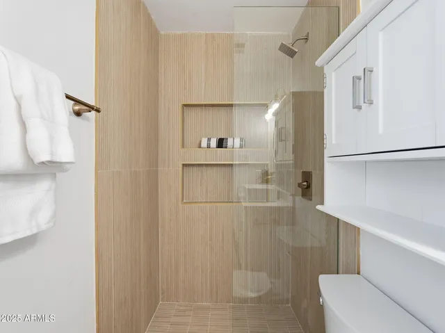 a work room with furniture and wooden floor