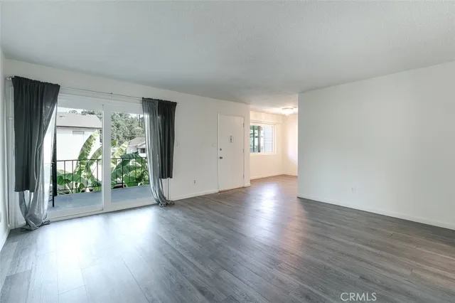 a kitchen with stainless steel appliances granite countertop a stove top oven and sink