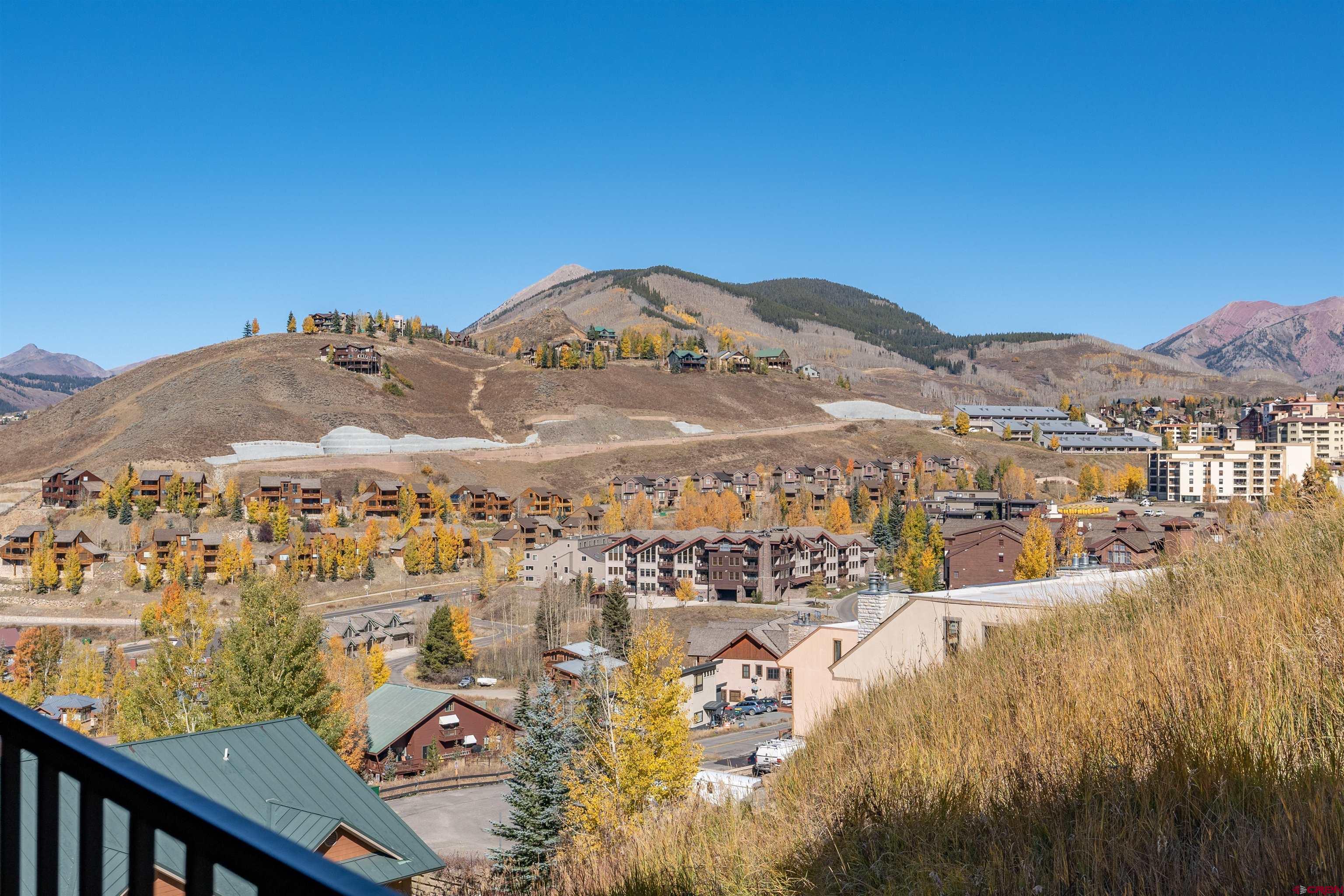 a view of a city with tall buildings in the background