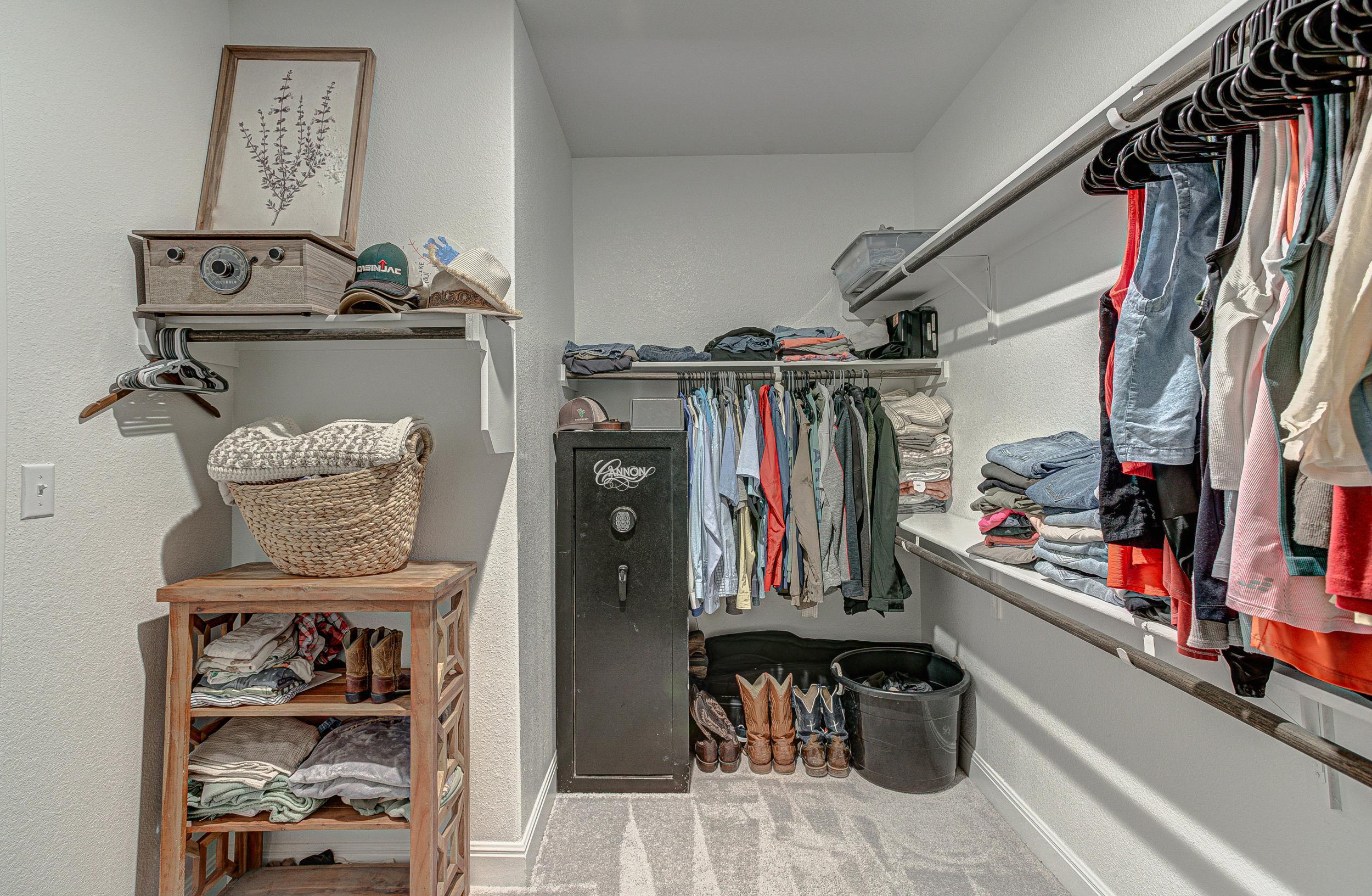 149 Slenderleaf Drive Marble Falls, TX 78654 - Photo 19 of 30 a view of walk in closet with clothes and shoes