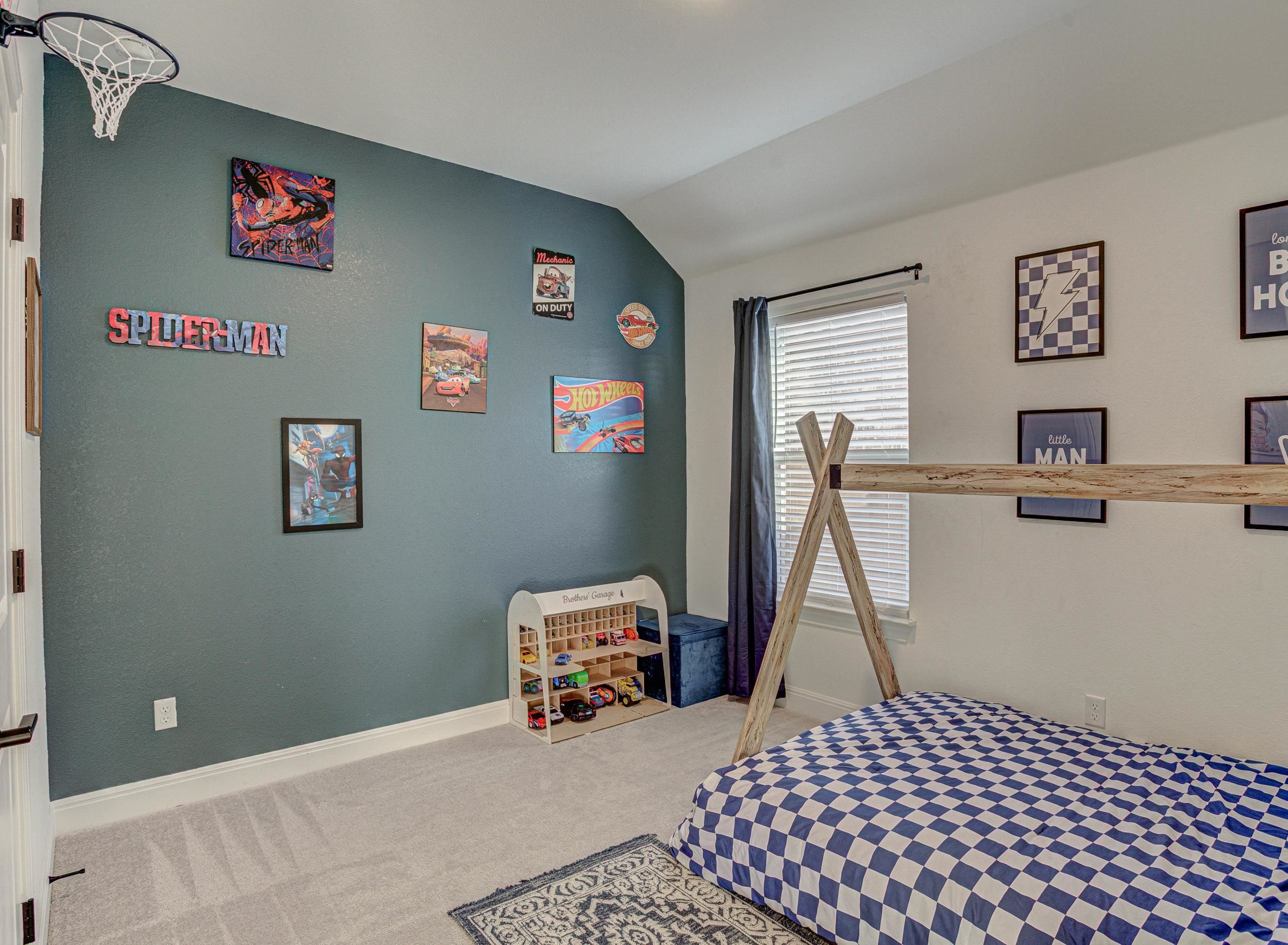 149 Slenderleaf Drive Marble Falls, TX 78654 - Photo 21 of 30 a bedroom with a bed and a table in it