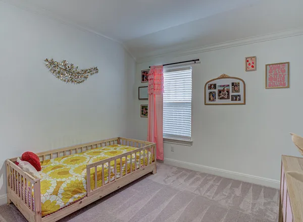 a view of room with hardwood floor and windows