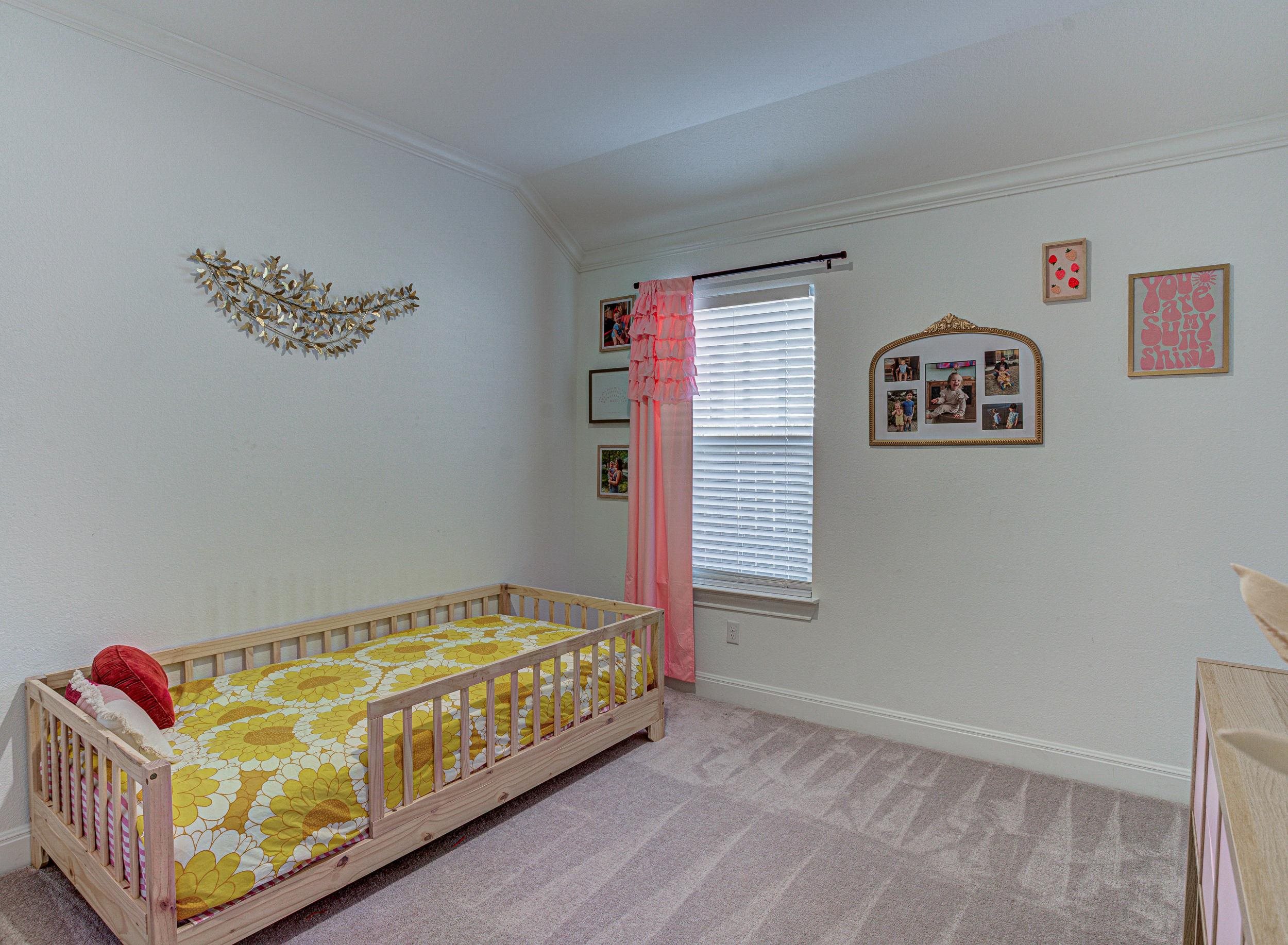 149 Slenderleaf Drive Marble Falls, TX 78654 - Photo 23 of 30 a bedroom with a bed and window