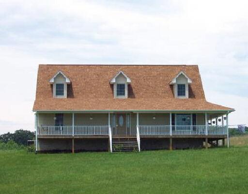 a view of outdoor space yard and front view of a house