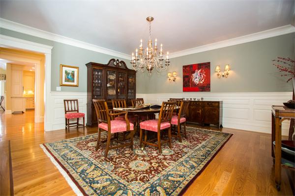 56 Windsor Road Wellesley, MA 02481 - Photo 8 of 24 a view of a dining room with furniture and a chandelier