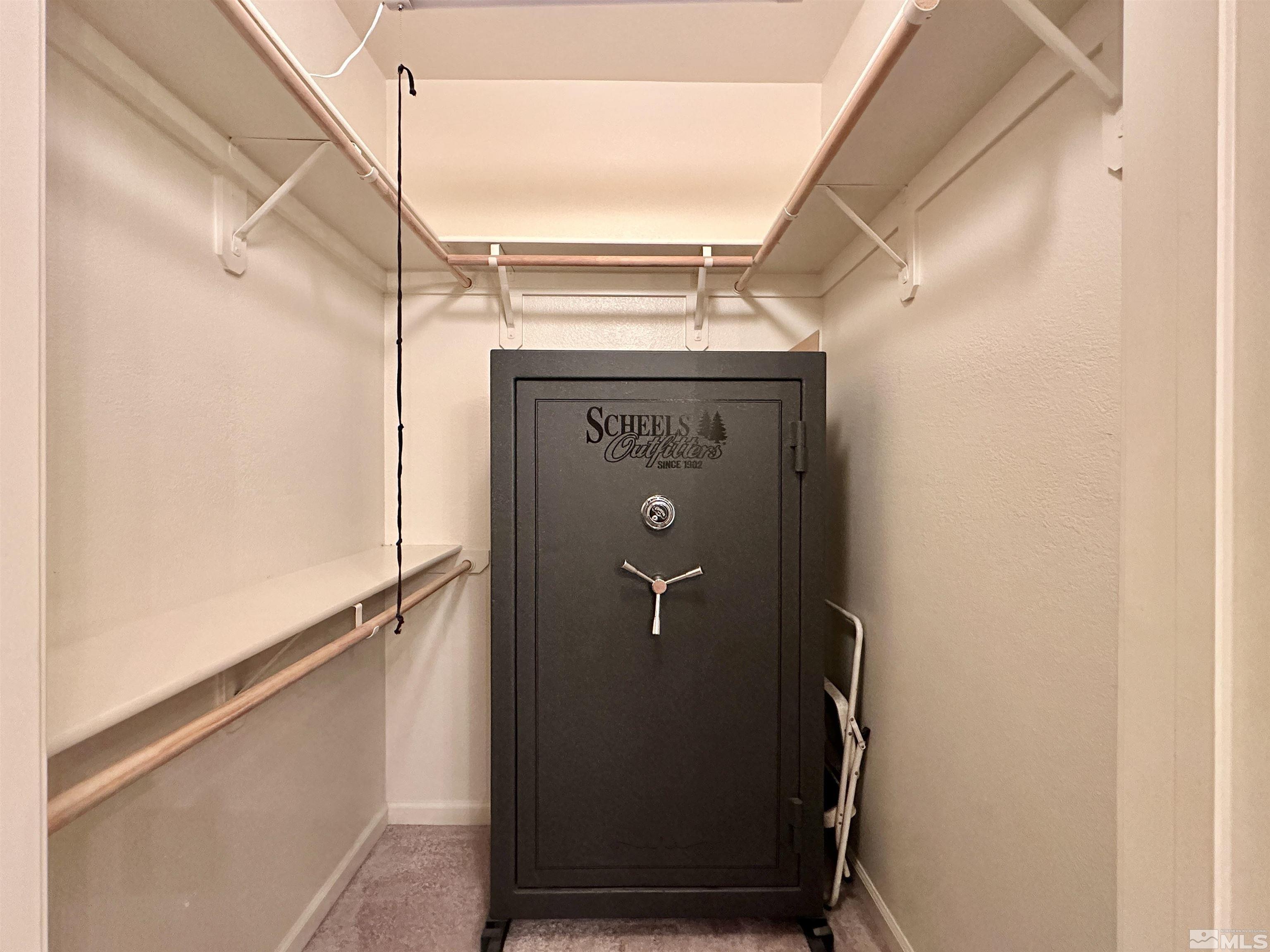 9050 Double R Boulevard, Unit 311 Reno, NV 89521 - Photo 17 of 37 a view of walk in closet with clothes and shoes