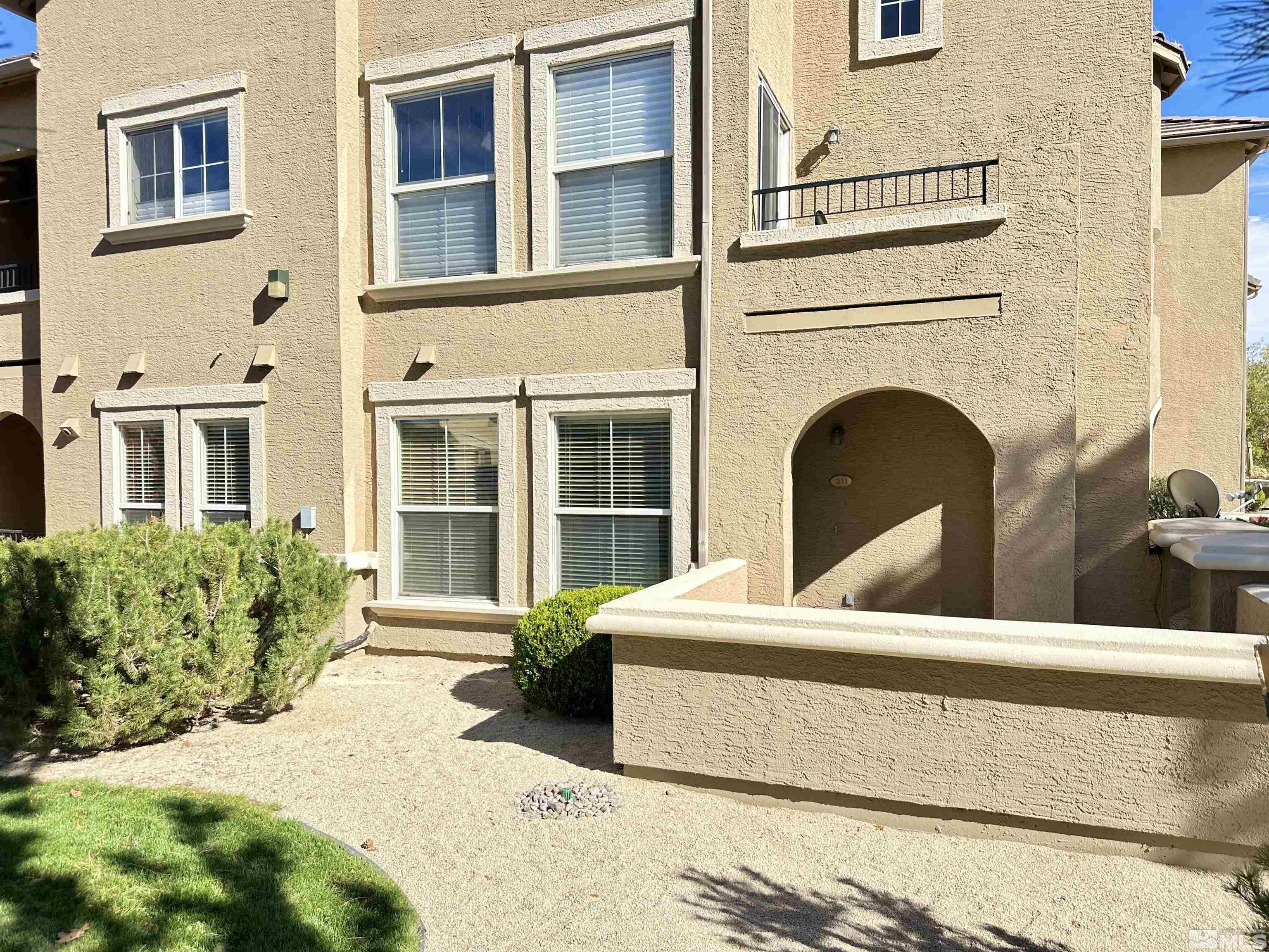 9050 Double R Boulevard, Unit 311 Reno, NV 89521 - Photo 2 of 37 a view of house with yard outdoor seating