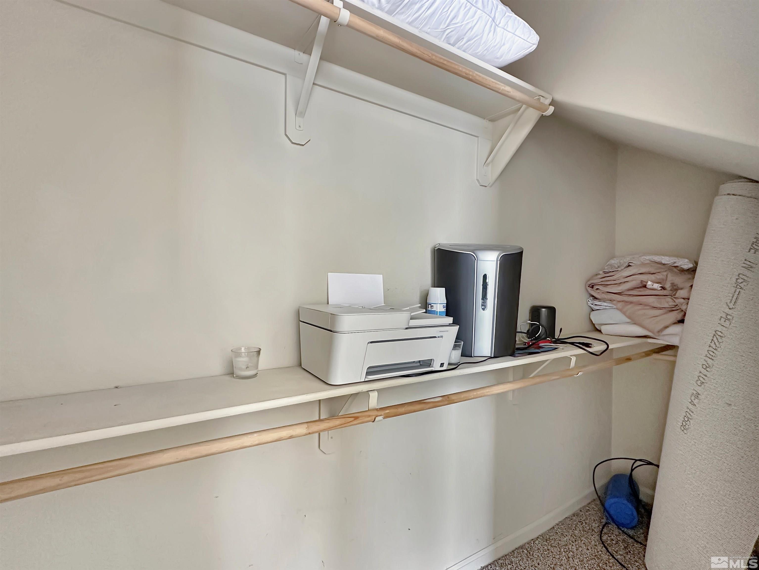 9050 Double R Boulevard, Unit 311 Reno, NV 89521 - Photo 21 of 37 a bathroom with a sink and a toilet