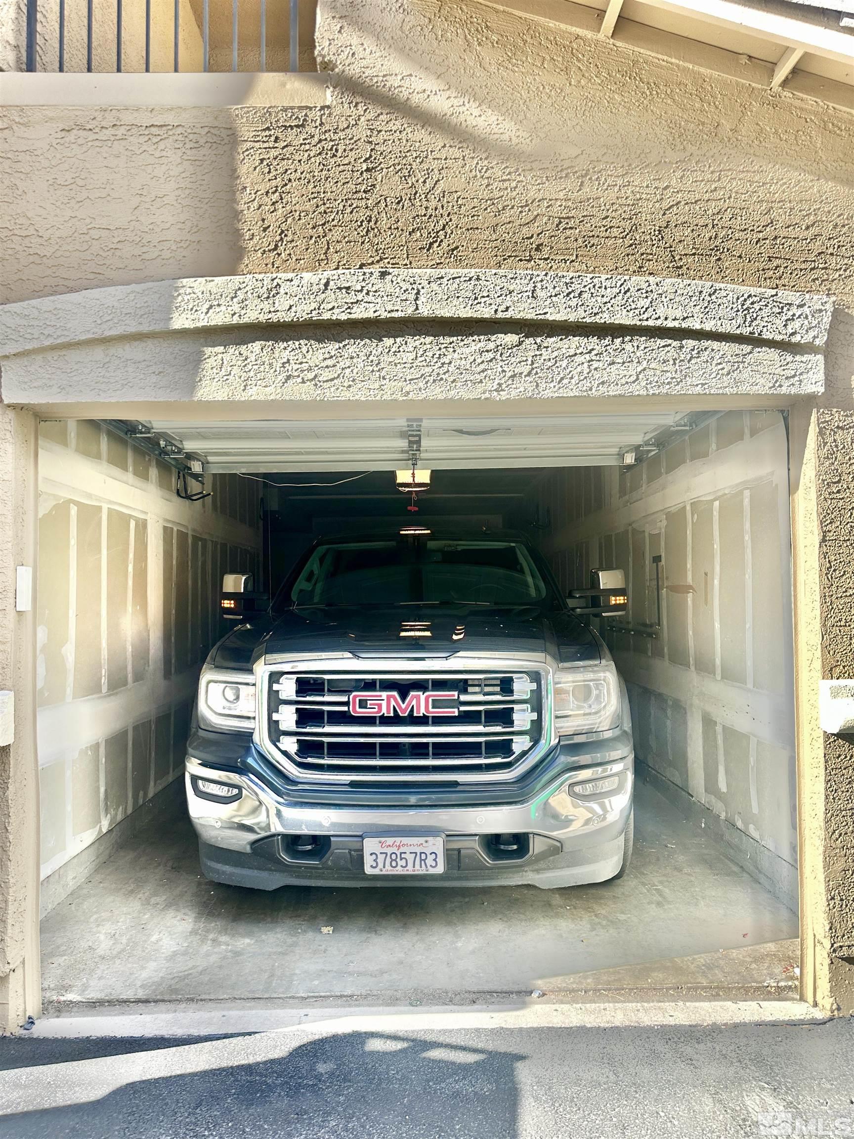 9050 Double R Boulevard, Unit 311 Reno, NV 89521 - Photo 26 of 37 a view of car in garage
