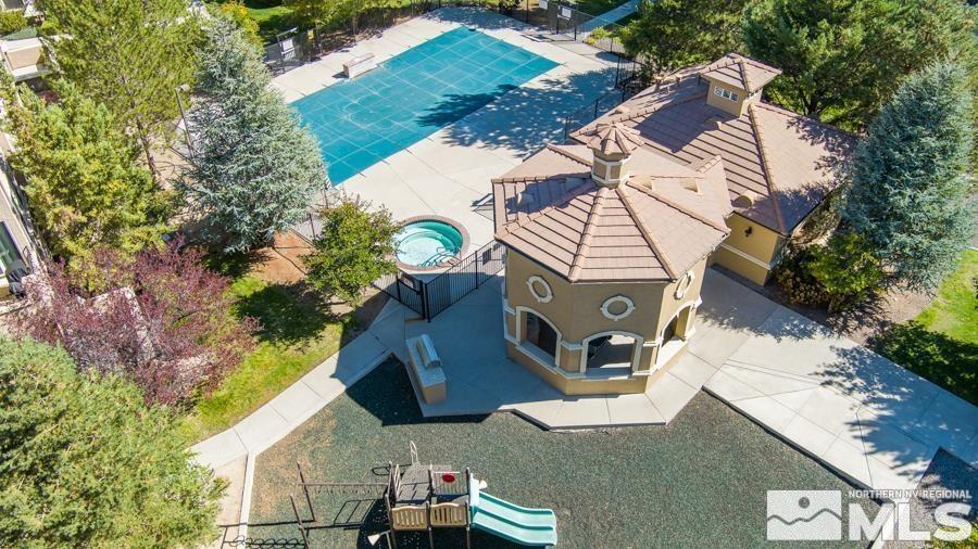 9050 Double R Boulevard, Unit 311 Reno, NV 89521 - Photo 29 of 37 an aerial view of a house with a yard