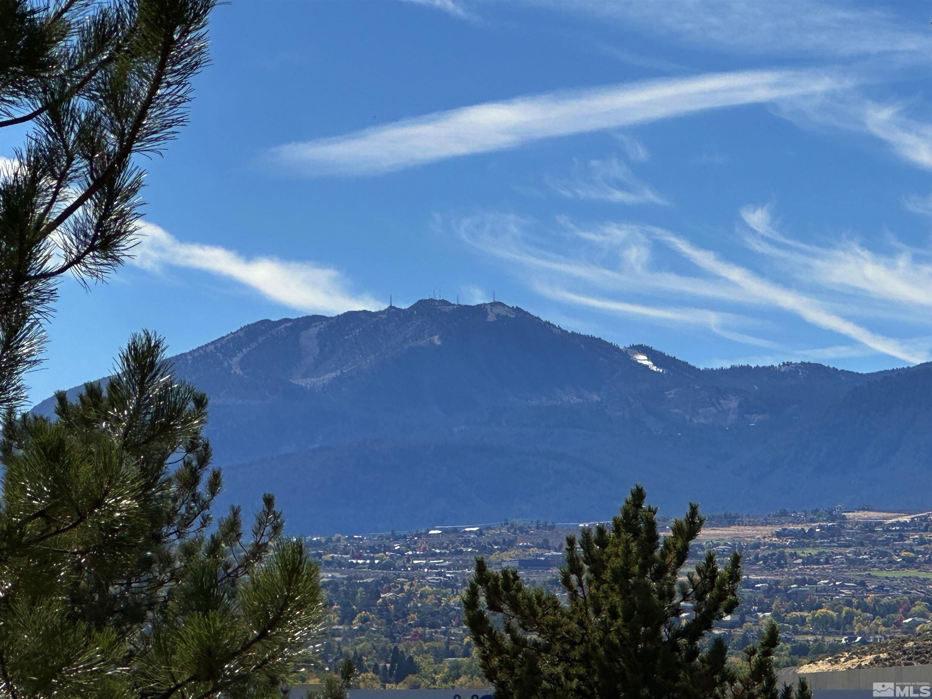 9050 Double R Boulevard, Unit 311 Reno, NV 89521 - Photo 5 of 37 a view of a lake and a mountain