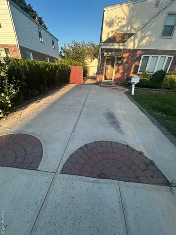 a view of a porch with a bench