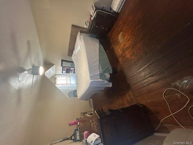 182 Wellington Road Elmont, NY 11003 - Photo 6 of 12 a living room with a couch