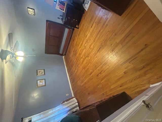 182 Wellington Road Elmont, NY 11003 - Photo 7 of 12 a bed room with a bed