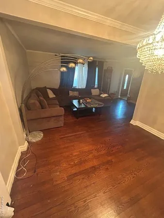 a living room with couch and a table